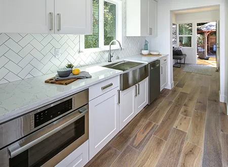 Galley kitchen with white theme