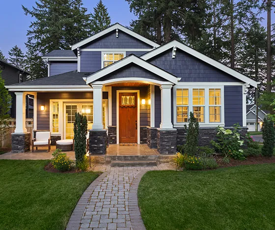 Whole Home Remodel blue exterior with red door